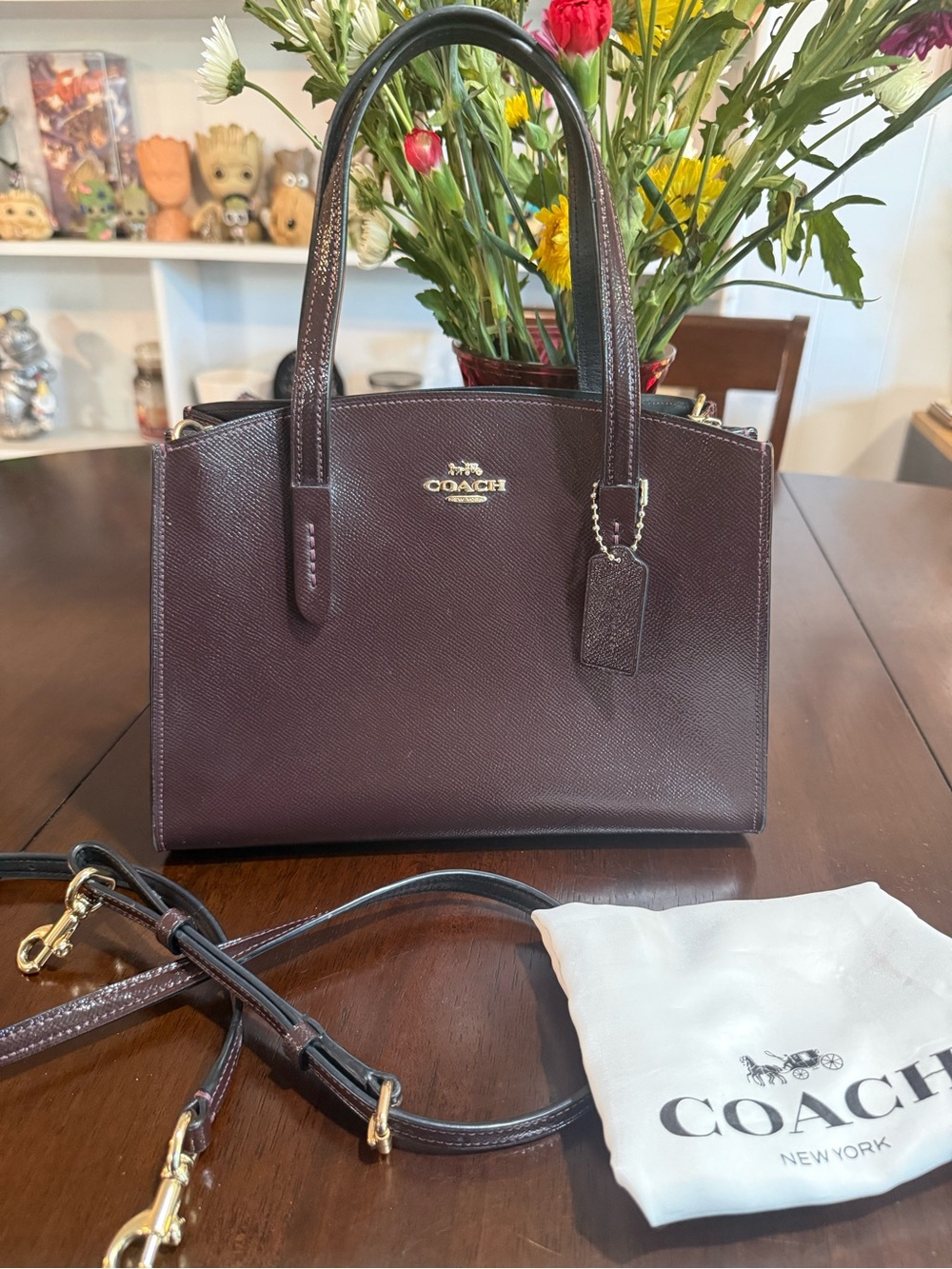 Coach Charlie Carryall 28 in oxblood cross grain glazed leather